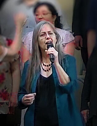 Ronautta Wilson singing solo with choir at her local church